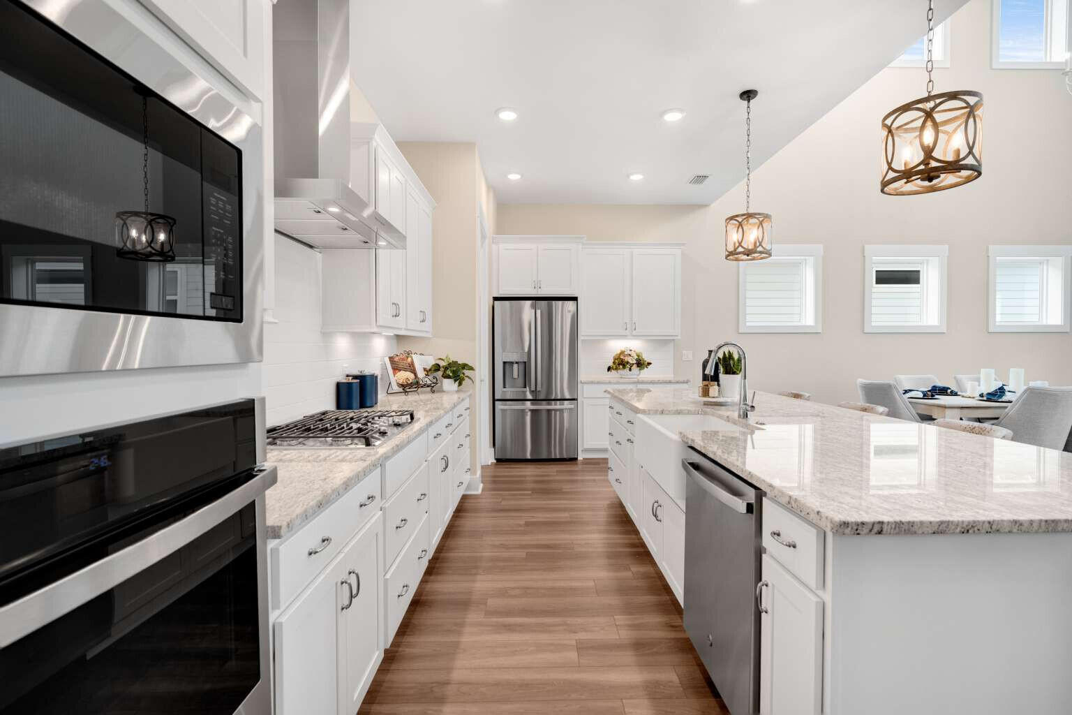 1760 Pathways Dr Inlet Beach Inlet Beach, FL 32461 - Photo 11 of 36 a large kitchen with stainless steel appliances lots of counter space and wooden floor