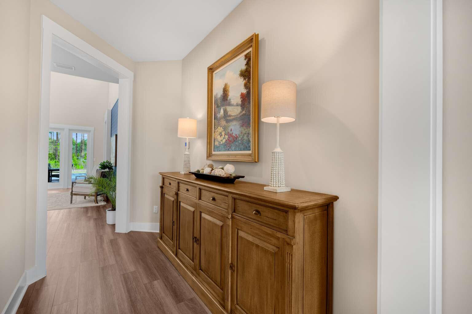 1760 Pathways Dr Inlet Beach Inlet Beach, FL 32461 - Photo 16 of 36 a view of a hallway with wooden floor and a bathroom