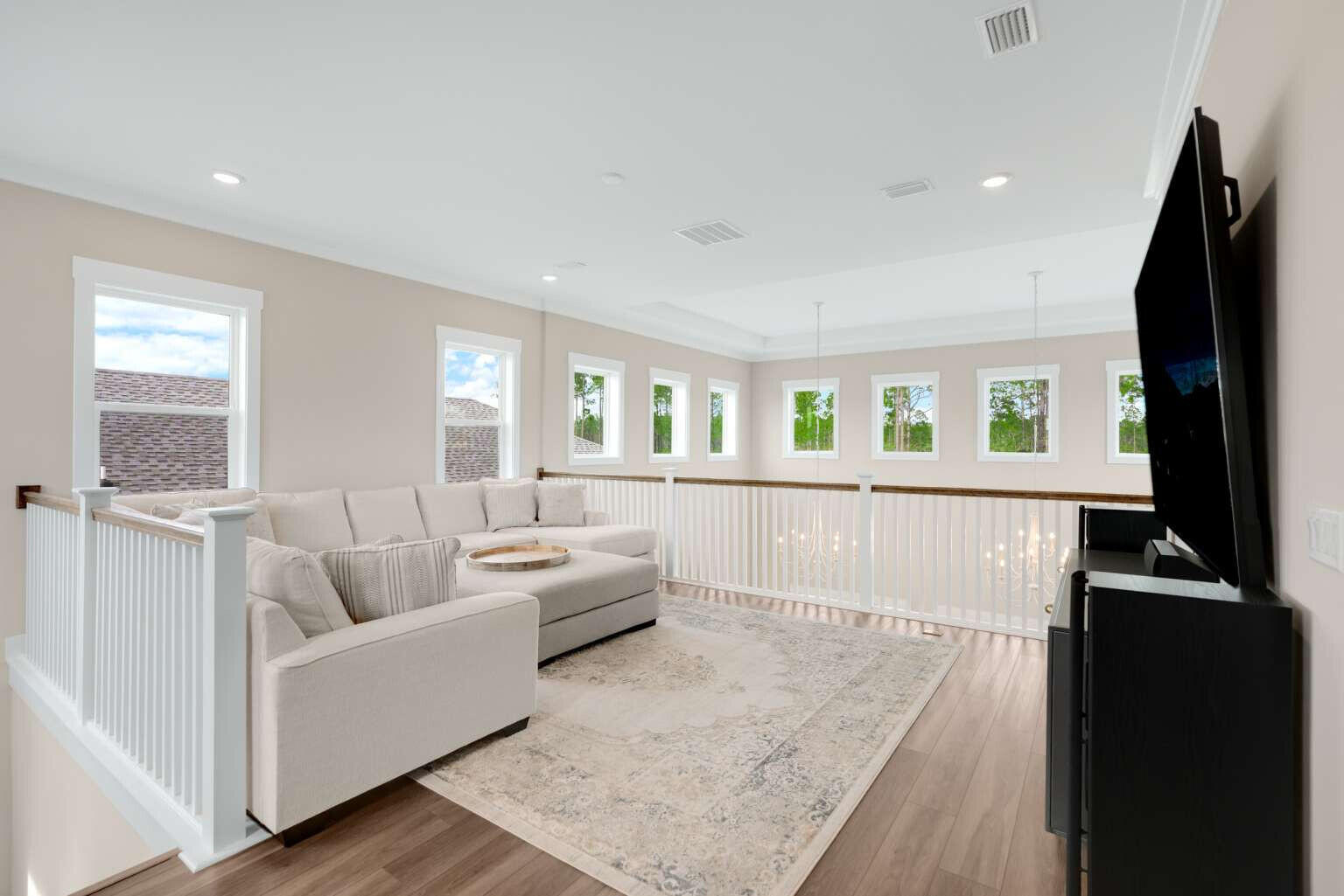 1760 Pathways Dr Inlet Beach Inlet Beach, FL 32461 - Photo 29 of 36 a living room with furniture and a flat screen tv