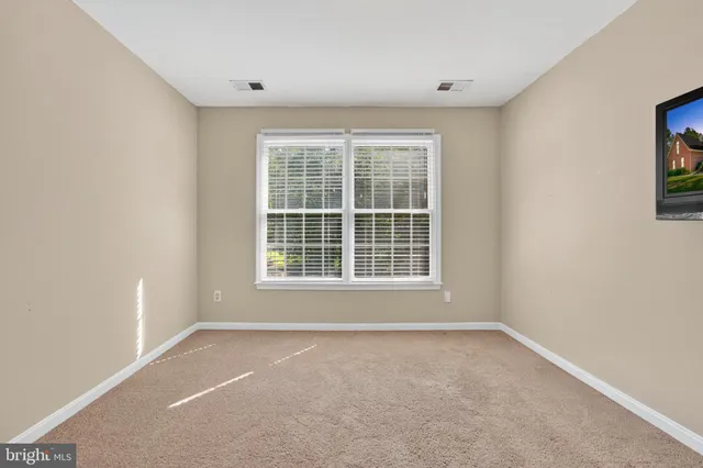 a view of a yard in front of house