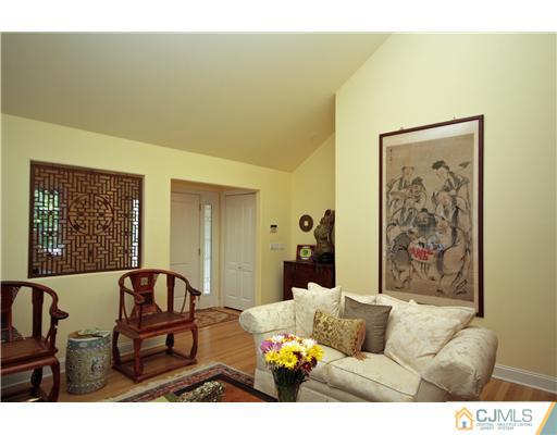 158 Valley Road Princeton, NJ 08540 - Photo 11 of 25 a living room with furniture and painting on the wall