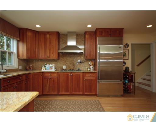 158 Valley Road Princeton, NJ 08540 - Photo 12 of 25 a kitchen with stainless steel appliances granite countertop a refrigerator a sink and a stove