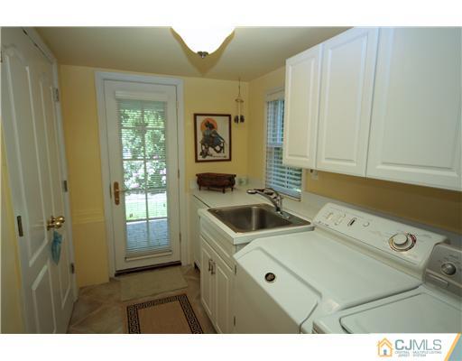 158 Valley Road Princeton, NJ 08540 - Photo 22 of 25 a kitchen that has a sink and a stove