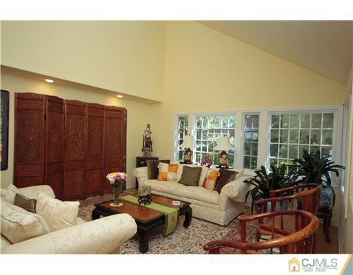 158 Valley Road Princeton, NJ 08540 - Photo 9 of 25 a living room with furniture and a large window