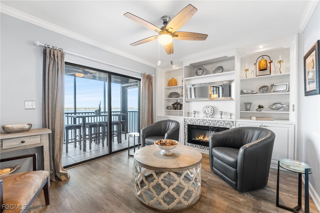 1910 Virginia Avenue, Unit 803 Fort Myers, FL 33901 - Photo 15 of 48 a living room with furniture fireplace and a window