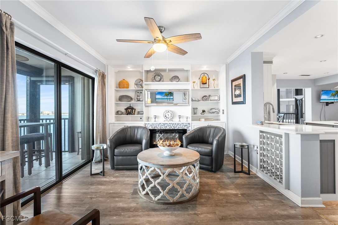 1910 Virginia Avenue, Unit 803 Fort Myers, FL 33901 - Photo 16 of 48 a living room with furniture and a large window