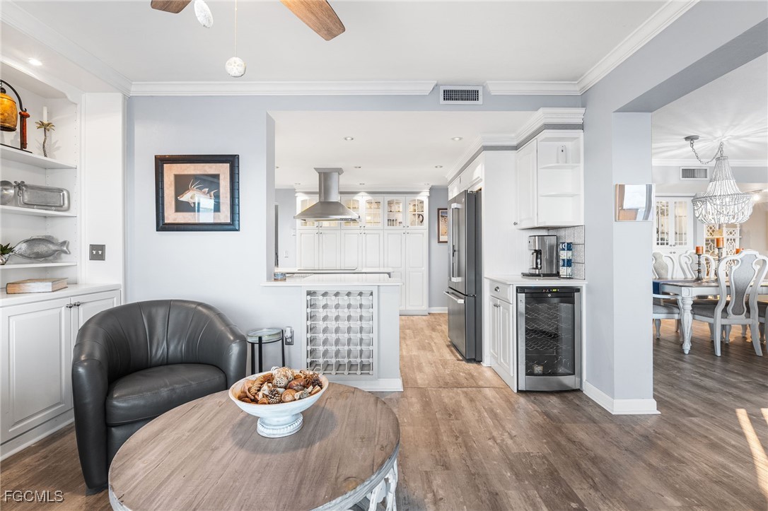 1910 Virginia Avenue, Unit 803 Fort Myers, FL 33901 - Photo 18 of 48 a living room with furniture and a table