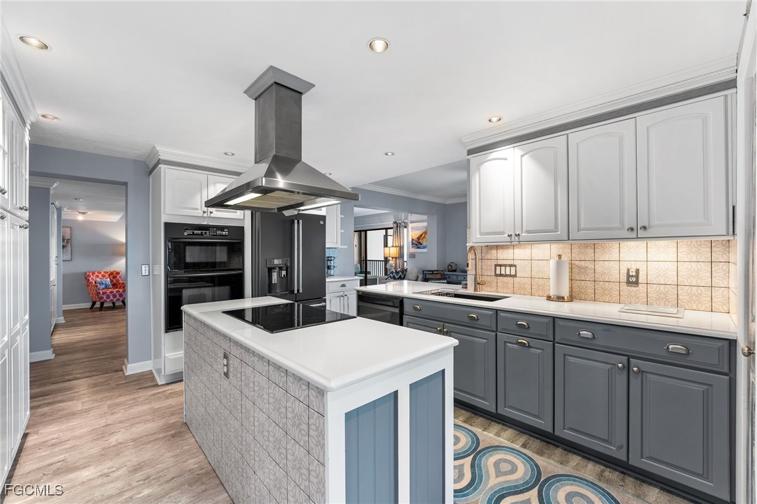 1910 Virginia Avenue, Unit 803 Fort Myers, FL 33901 - Photo 22 of 48 a kitchen with sink and cabinets