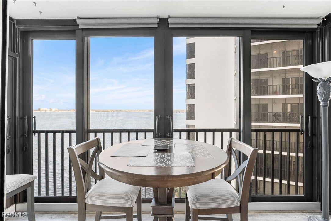 1910 Virginia Avenue, Unit 803 Fort Myers, FL 33901 - Photo 24 of 48 a view of a chairs and table in the balcony