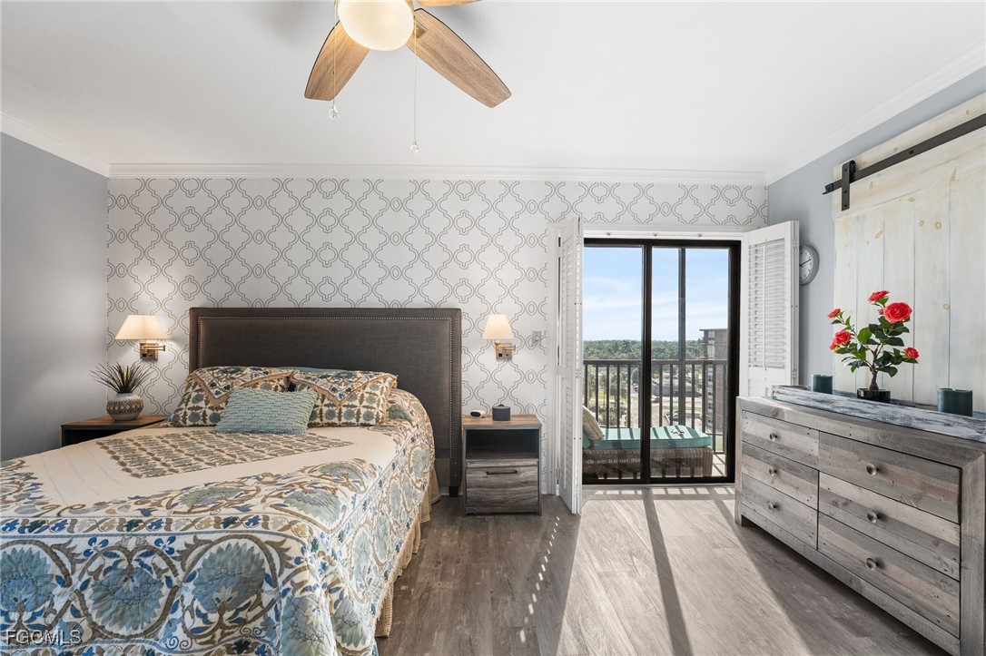 1910 Virginia Avenue, Unit 803 Fort Myers, FL 33901 - Photo 35 of 48 a bedroom with a large bed and a window