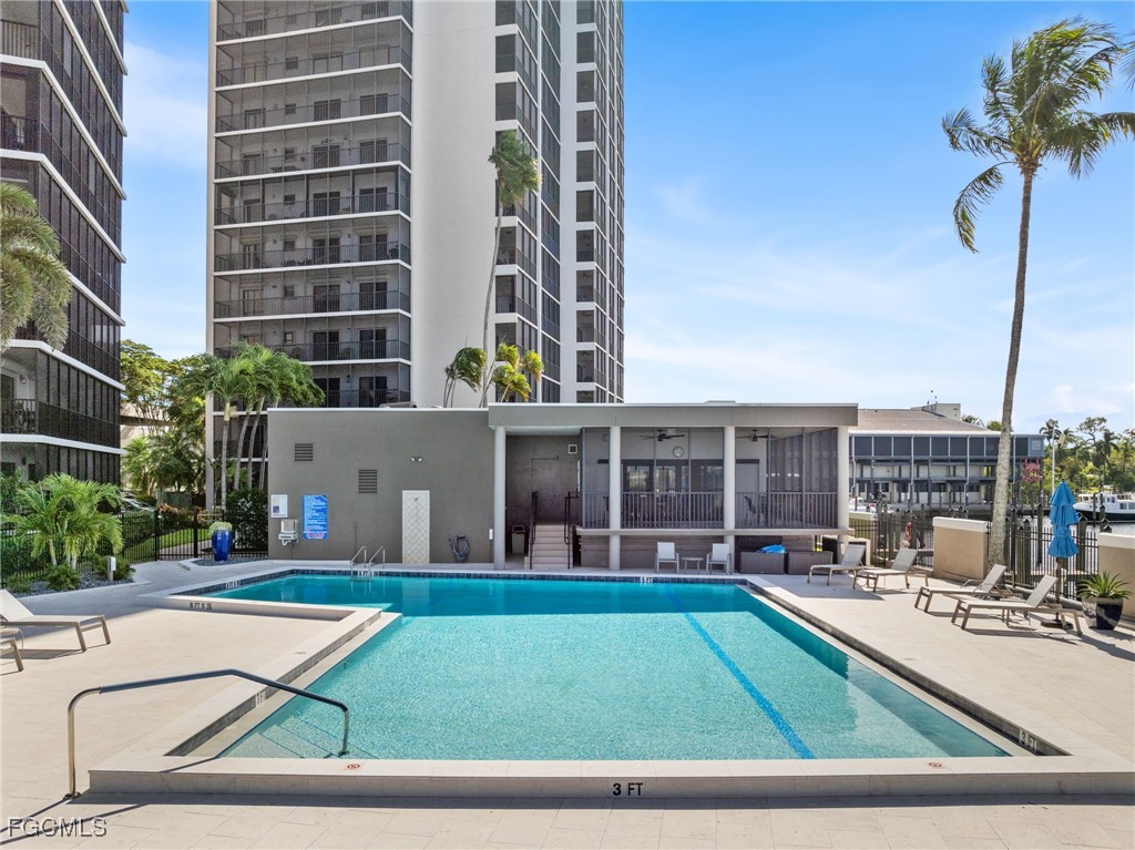 1910 Virginia Avenue, Unit 803 Fort Myers, FL 33901 - Photo 43 of 48 a view of a house with a swimming pool and sitting area