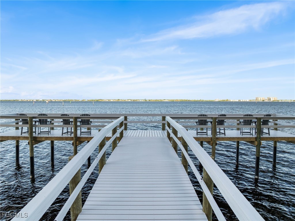 1910 Virginia Avenue, Unit 803 Fort Myers, FL 33901 - Photo 45 of 48 a view of balcony with wooden floor and ocean view