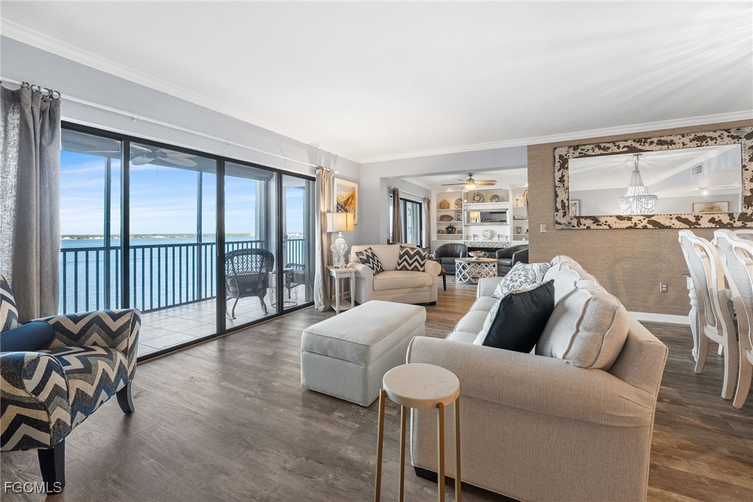 1910 Virginia Avenue, Unit 803 Fort Myers, FL 33901 - Photo 10 of 48 a living room with furniture and a window