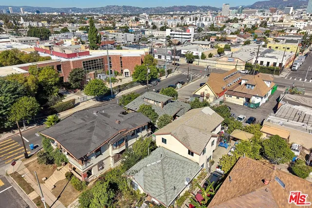 an aerial view of a city with lots of residential buildings