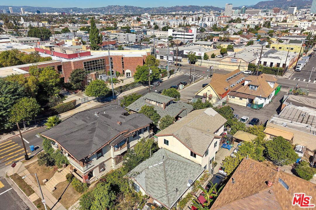 1312 South Ardmore Avenue Los Angeles, CA 90006 - Photo 6 of 7 an aerial view of a city with lots of residential buildings