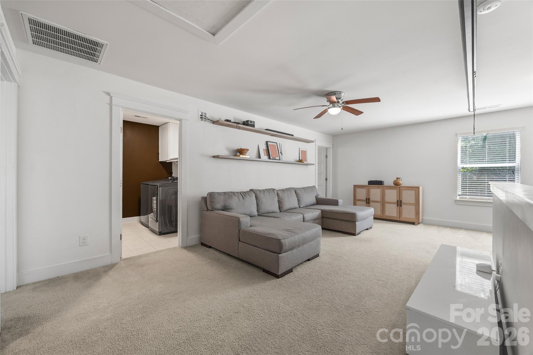 252 Hydrangea Drive Clover, SC 29710 - Photo 16 of 40 a living room with furniture and ceiling fan