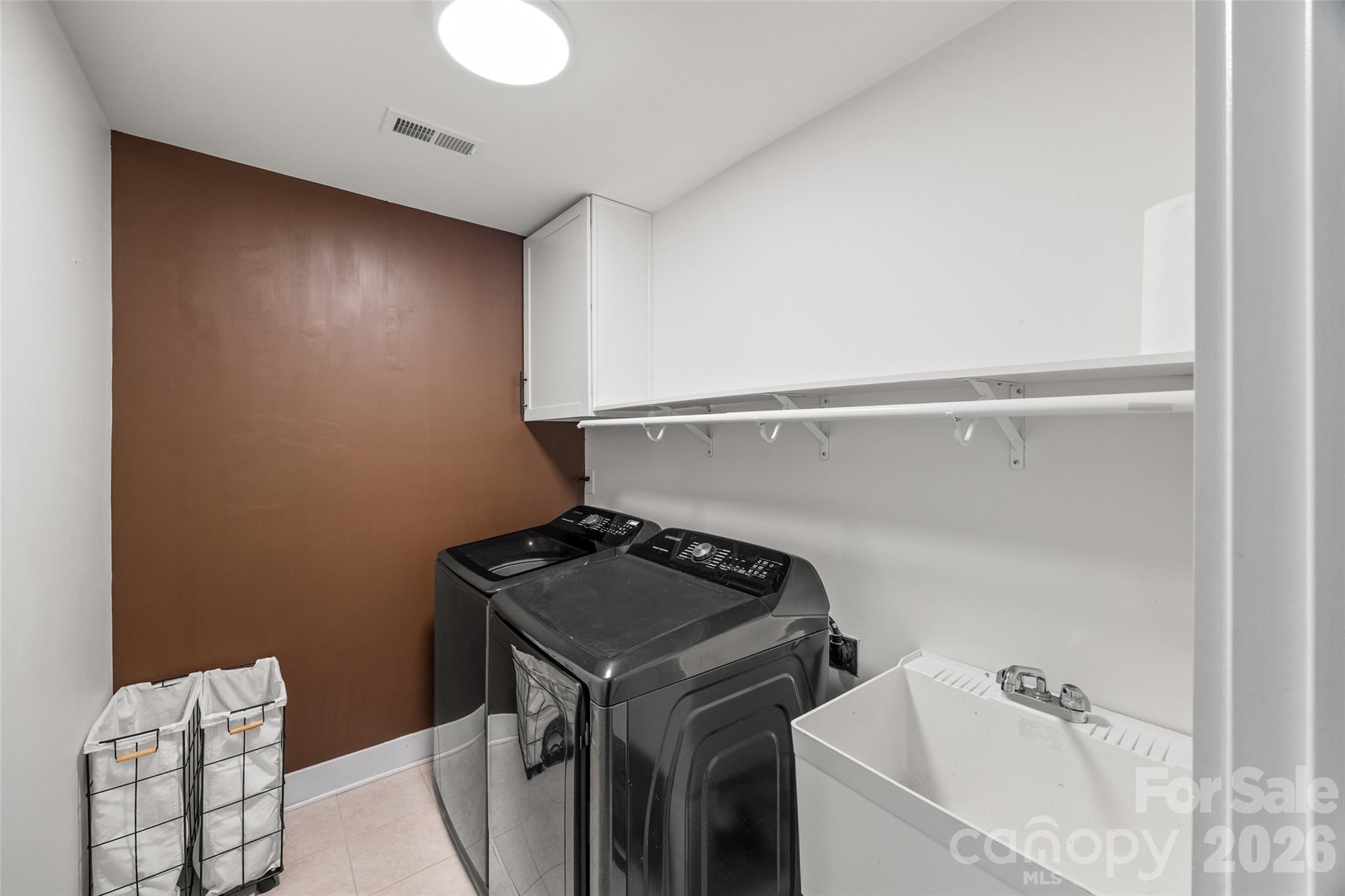 252 Hydrangea Drive Clover, SC 29710 - Photo 20 of 40 a bathroom with a sink and a toilet