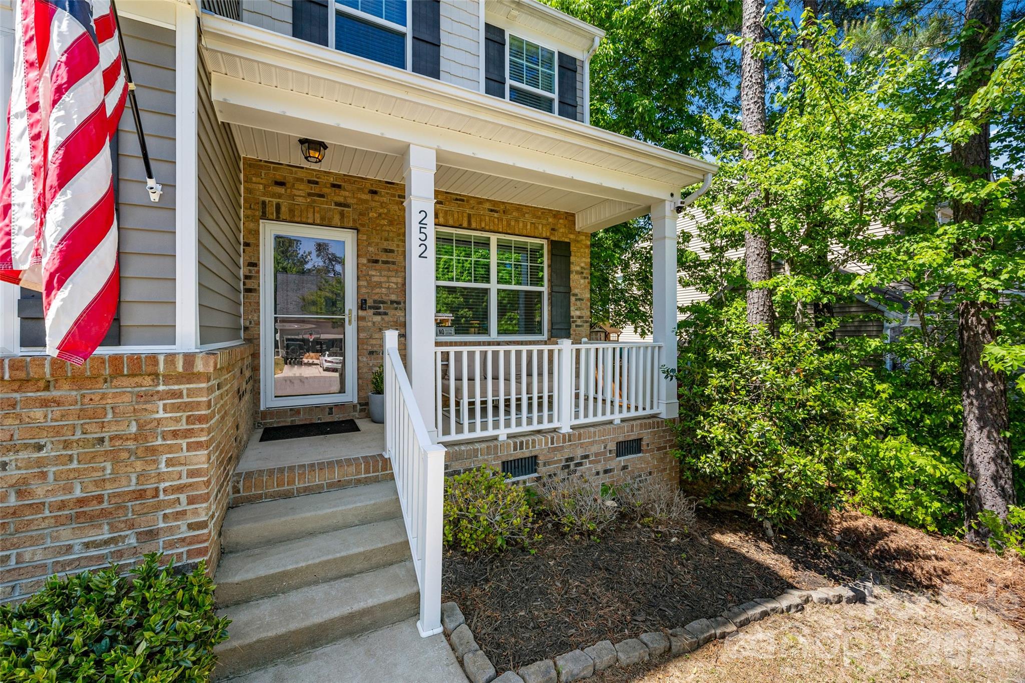 252 Hydrangea Drive Clover, SC 29710 - Photo 2 of 40 a view of a house with a small yard and wooden floor and fence
