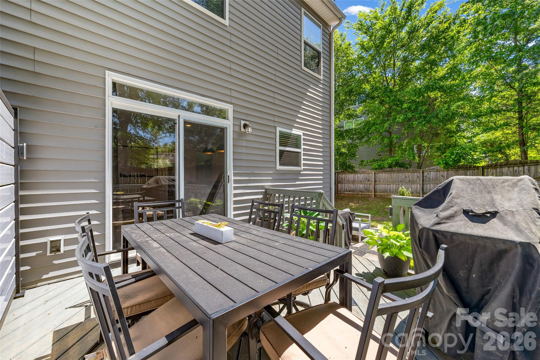 252 Hydrangea Drive Clover, SC 29710 - Photo 30 of 40 a view of a table and chairs in patio