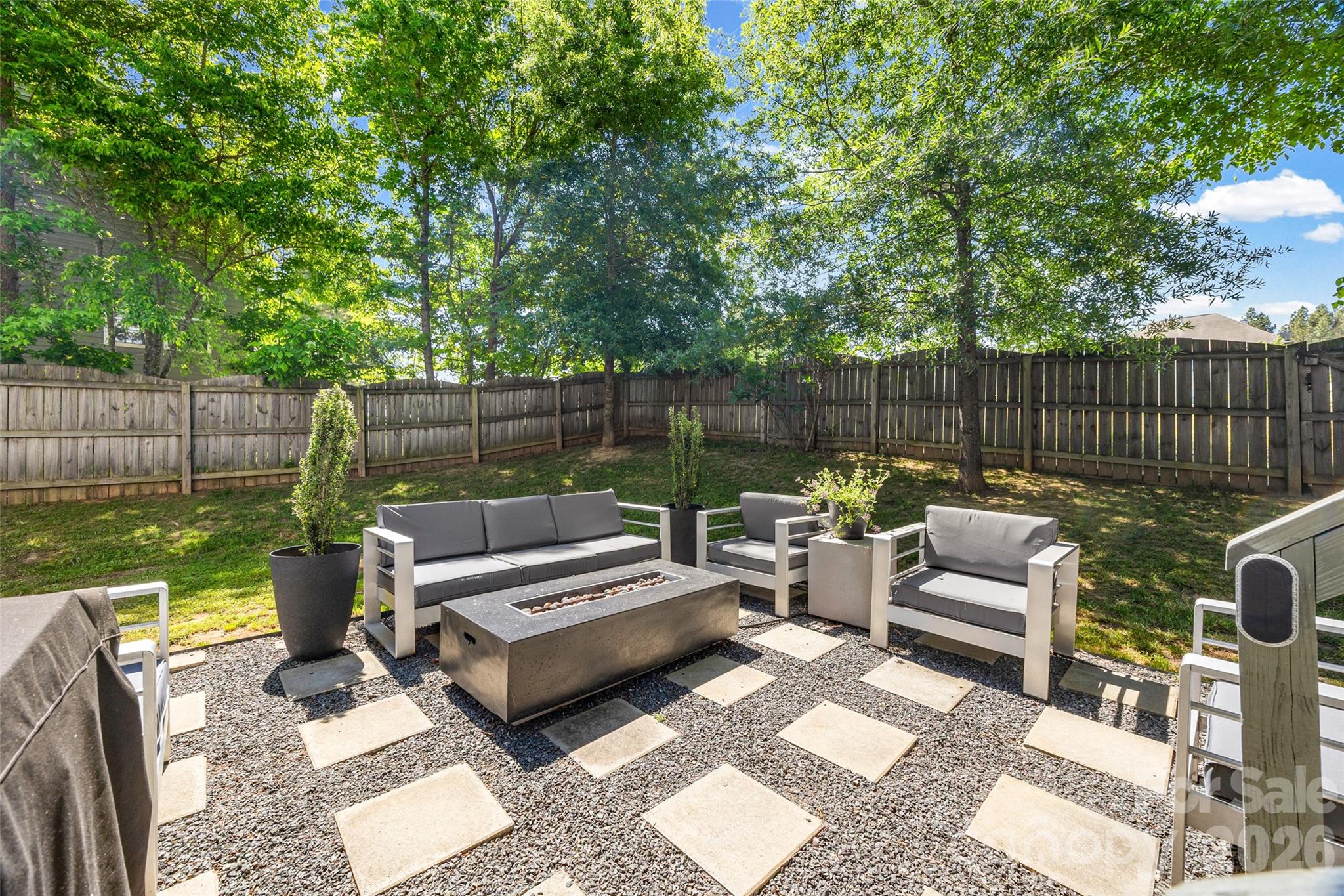 252 Hydrangea Drive Clover, SC 29710 - Photo 31 of 40 a view of a patio with couches chairs and a table