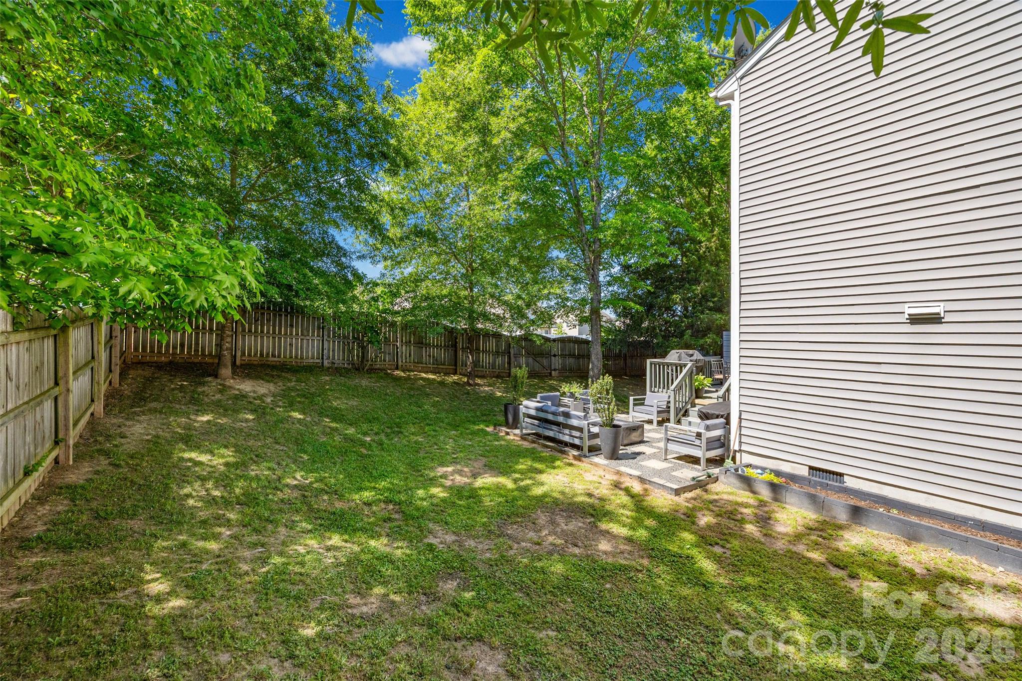 252 Hydrangea Drive Clover, SC 29710 - Photo 34 of 40 a view of backyard with a patio