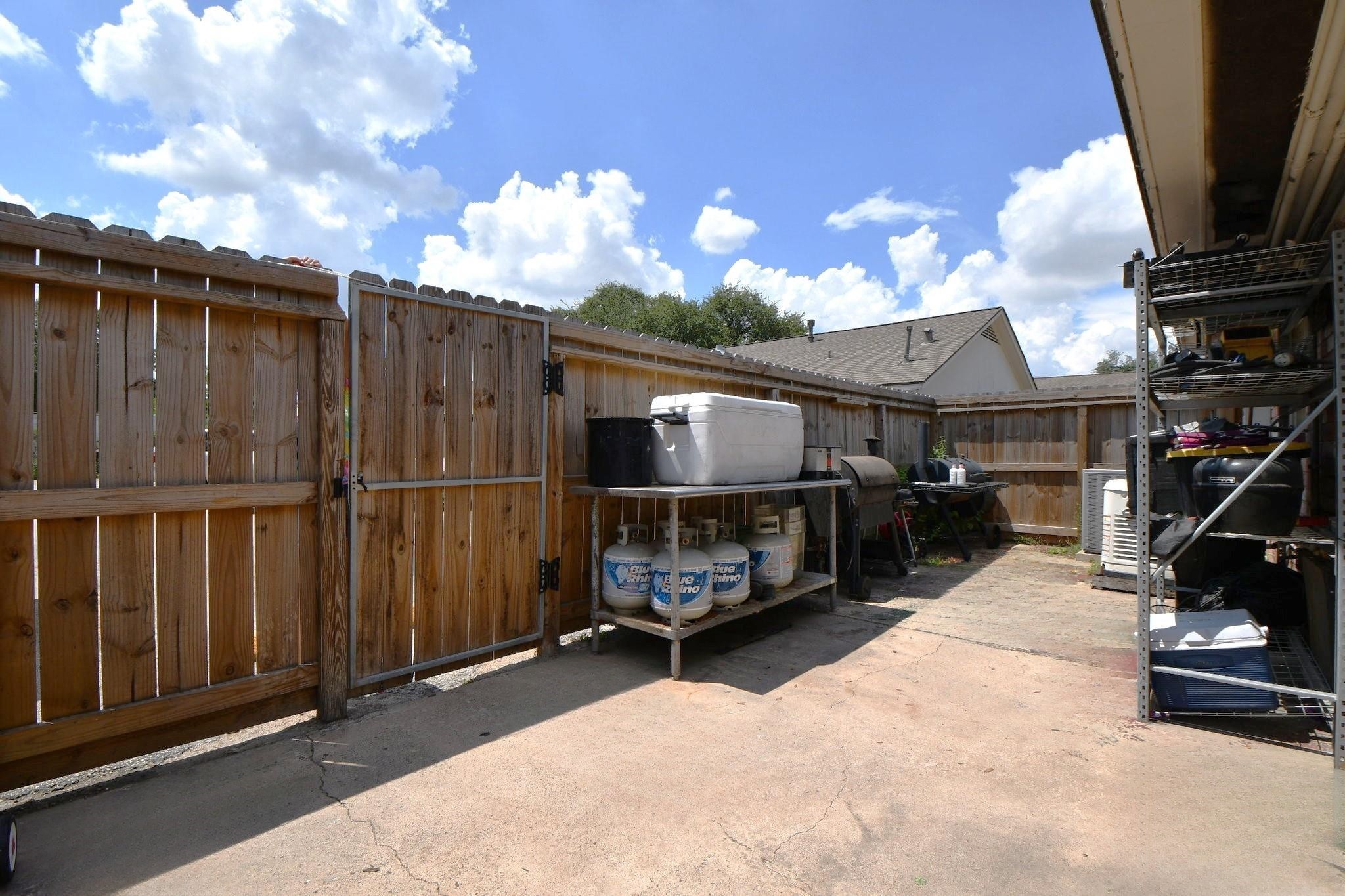 9458 Neuens Road, Unit 9458 Houston, TX 77080 - Photo 19 of 22 Back Exterior. Natural gas generator included in sale! Powers the whole house!