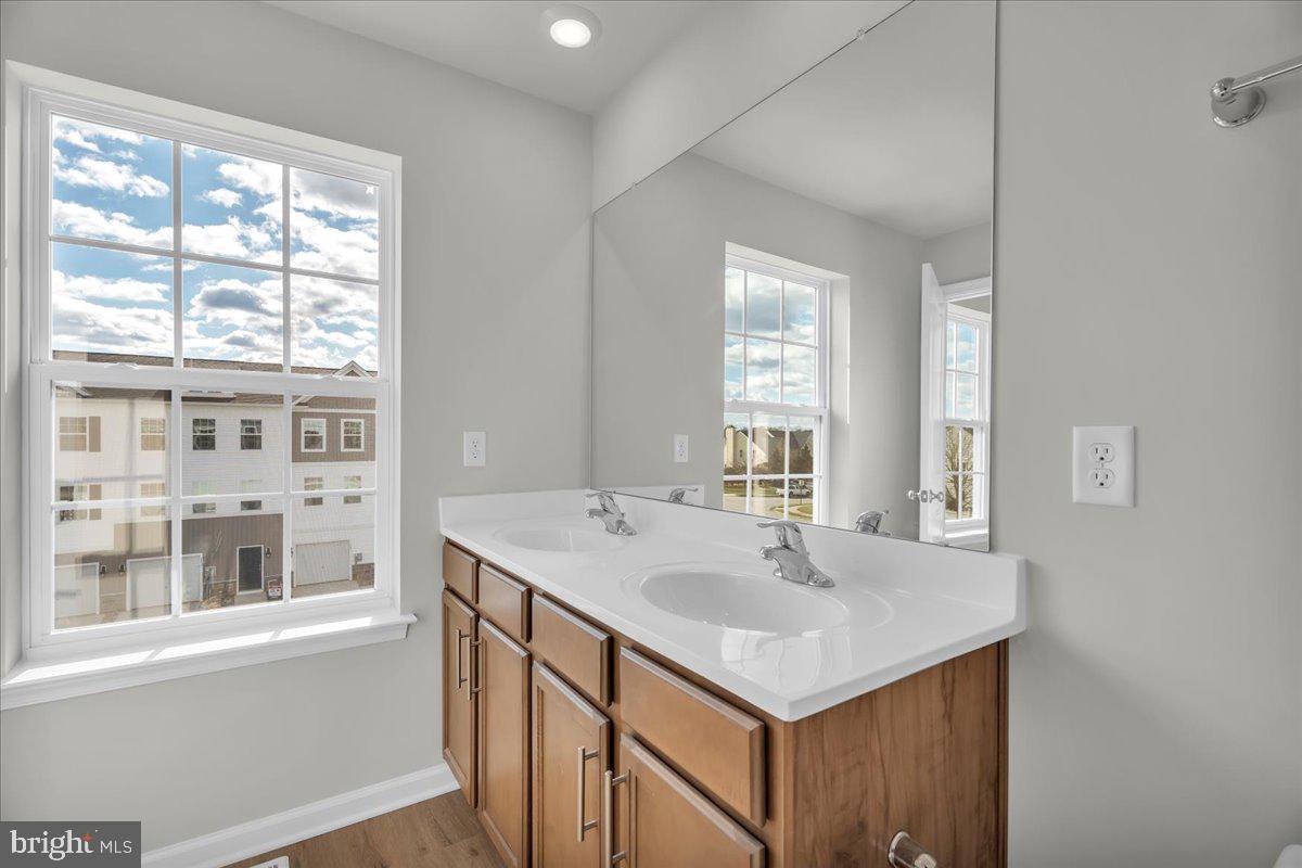 220 Sandy Rdg Road Sicklerville, NJ 08081 - Photo 18 of 24 a bathroom with a sink and a mirror