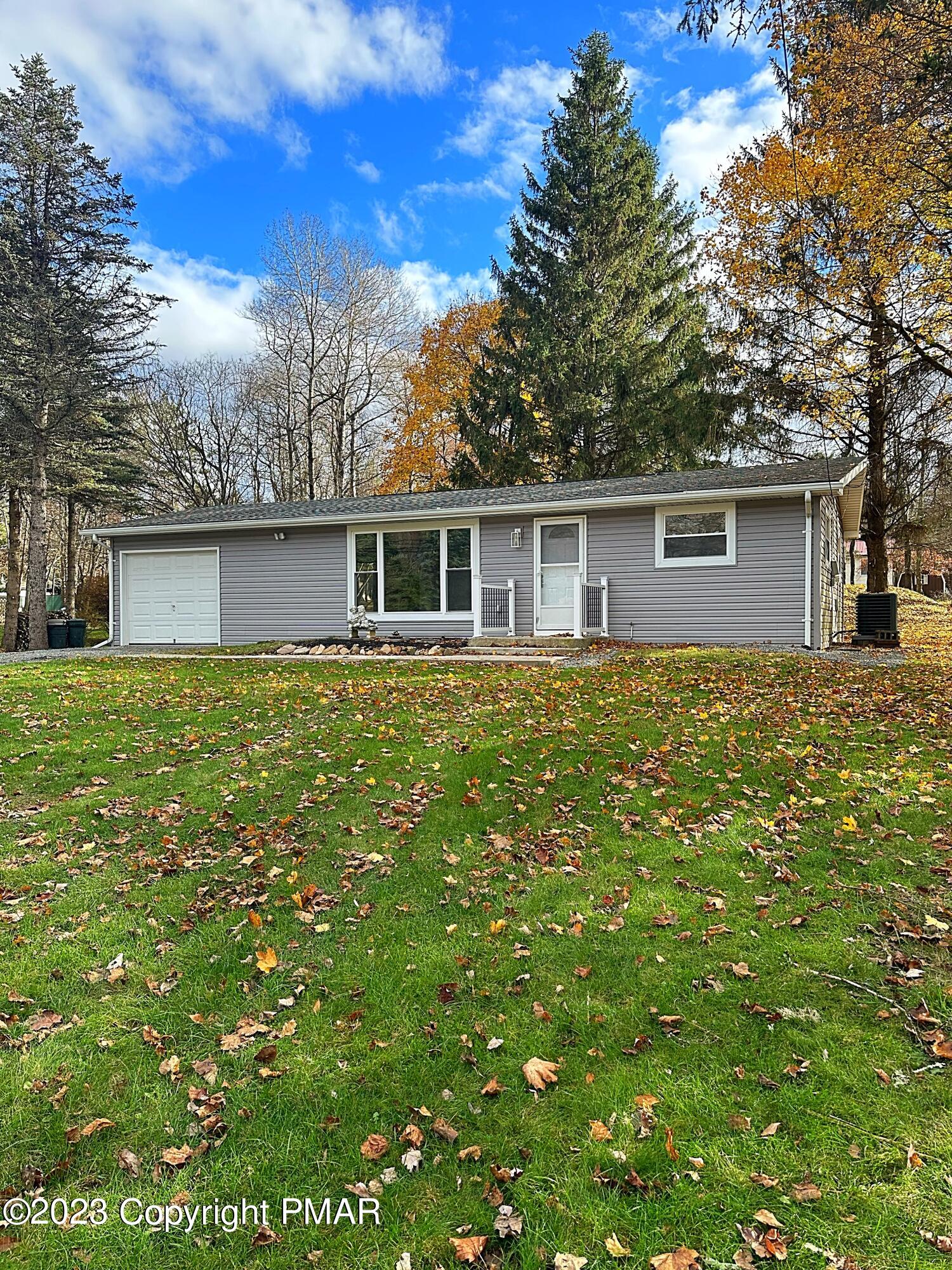 350 Mountain Road Albrightsville, PA 18210 - Photo 16 of 23 a front view of house with yard and trees