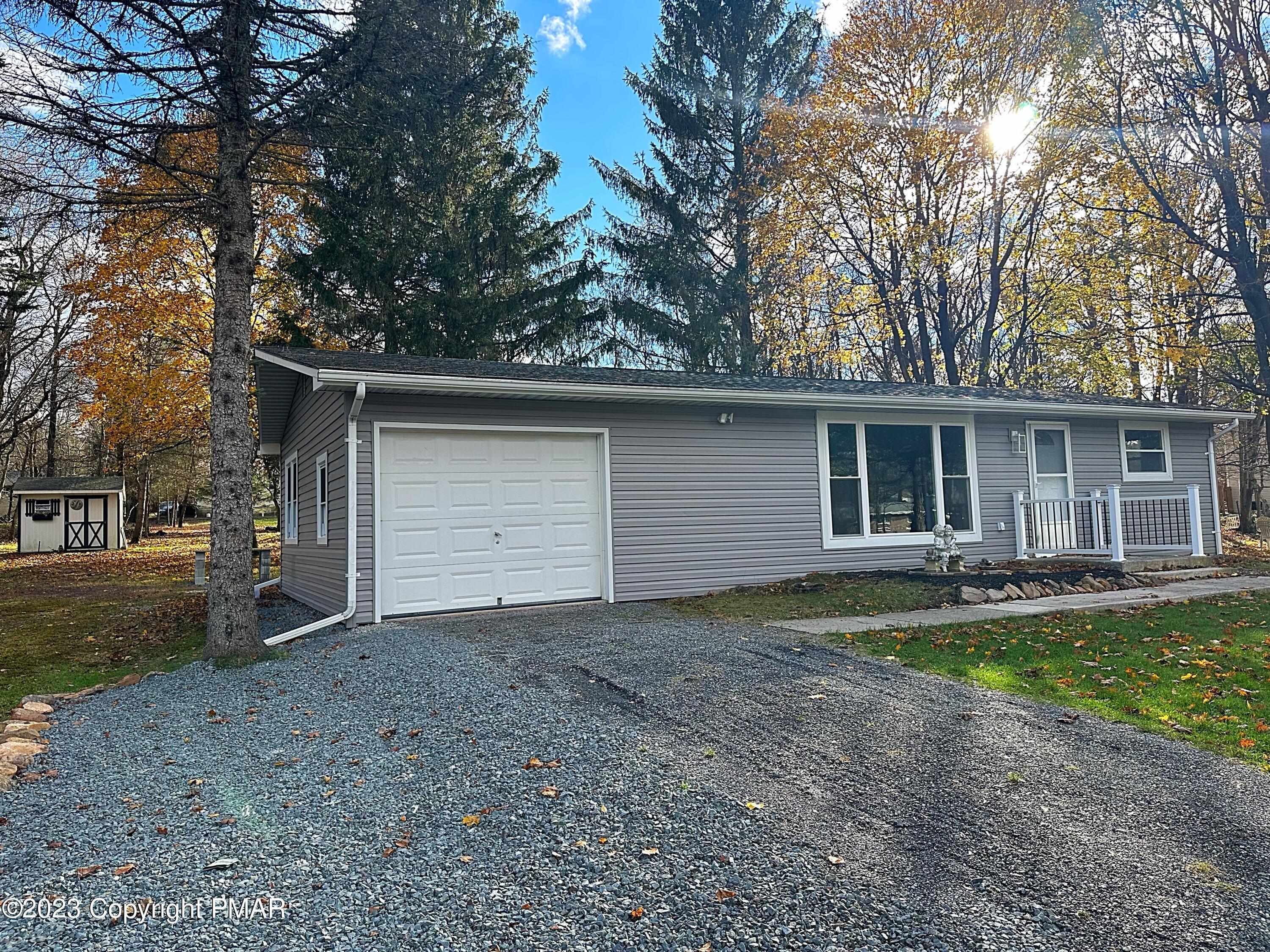350 Mountain Road Albrightsville, PA 18210 - Photo 19 of 23 a view of a house with a yard and large tree