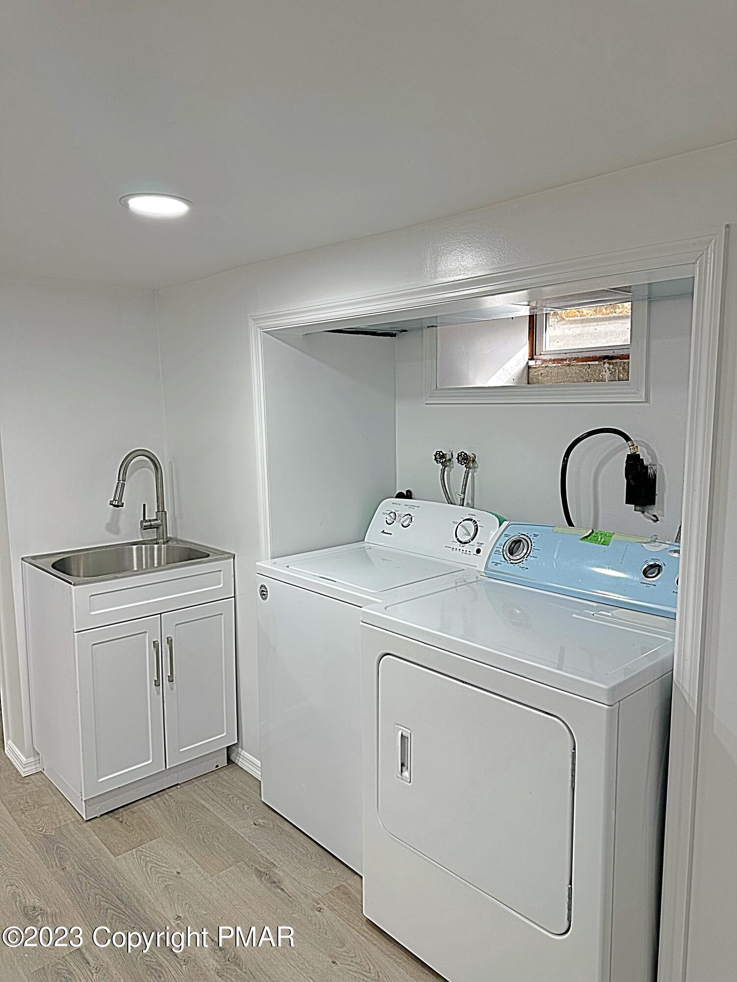350 Mountain Road Albrightsville, PA 18210 - Photo 21 of 23 a utility room with sink dryer and washer
