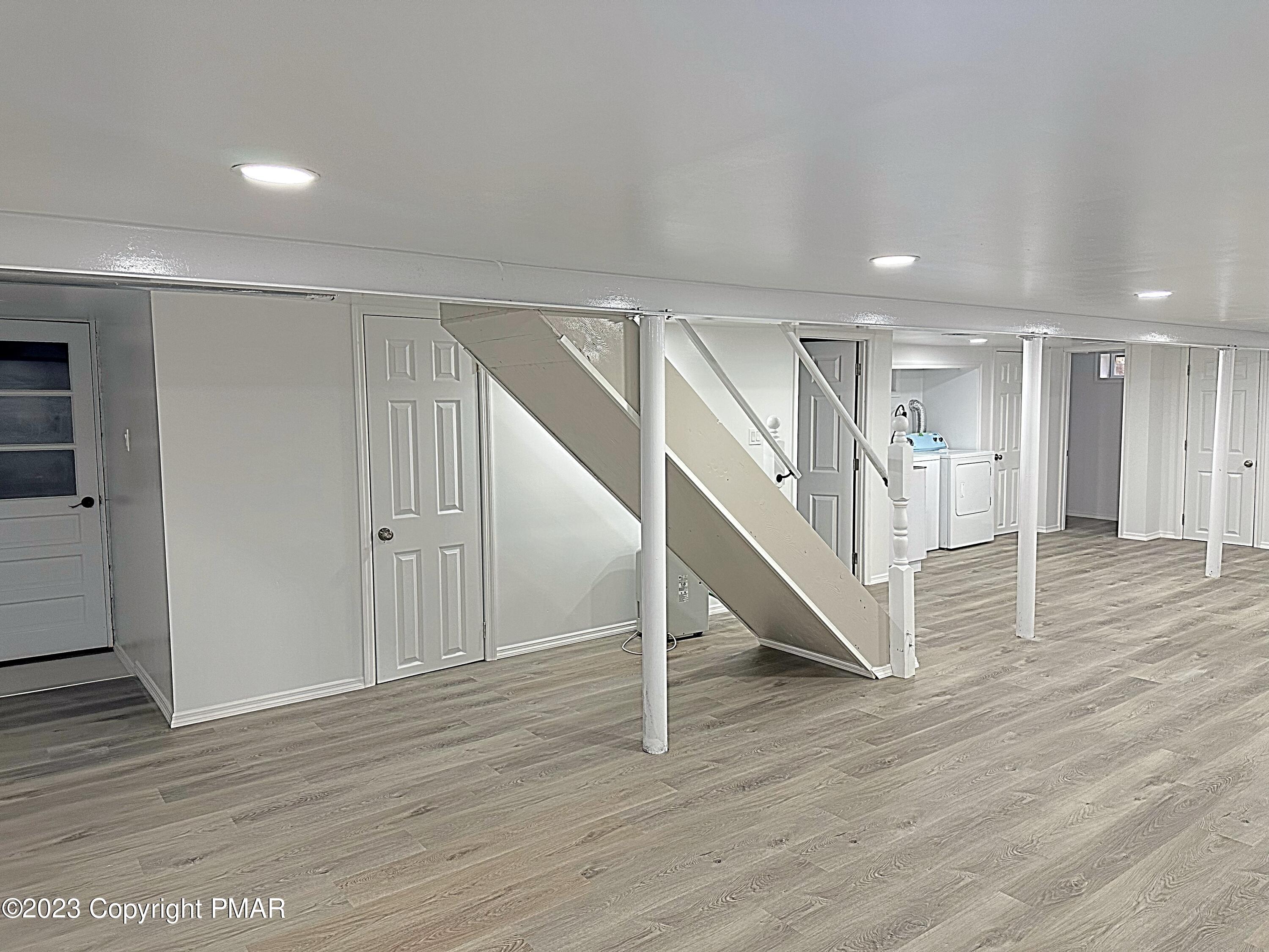 350 Mountain Road Albrightsville, PA 18210 - Photo 6 of 23 a view of entryway and hall with wooden floor