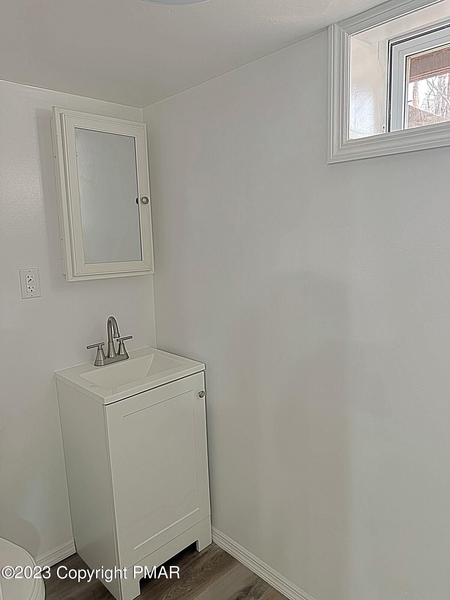 350 Mountain Road Albrightsville, PA 18210 - Photo 9 of 23 a bathroom with a sink and a vanity