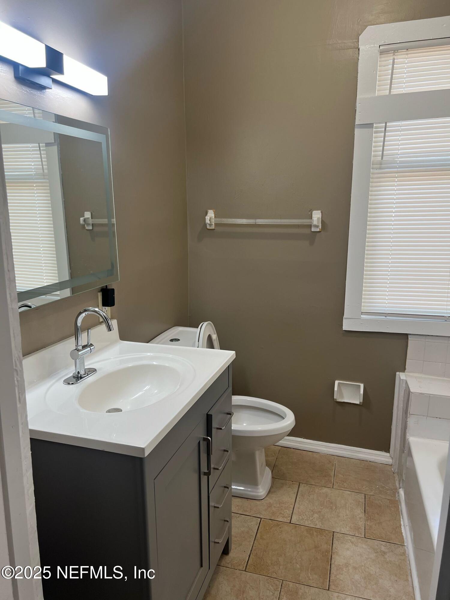 2815 Fleming Street Jacksonville, FL 32254 - Photo 11 of 37 a bathroom with a sink and a toilet