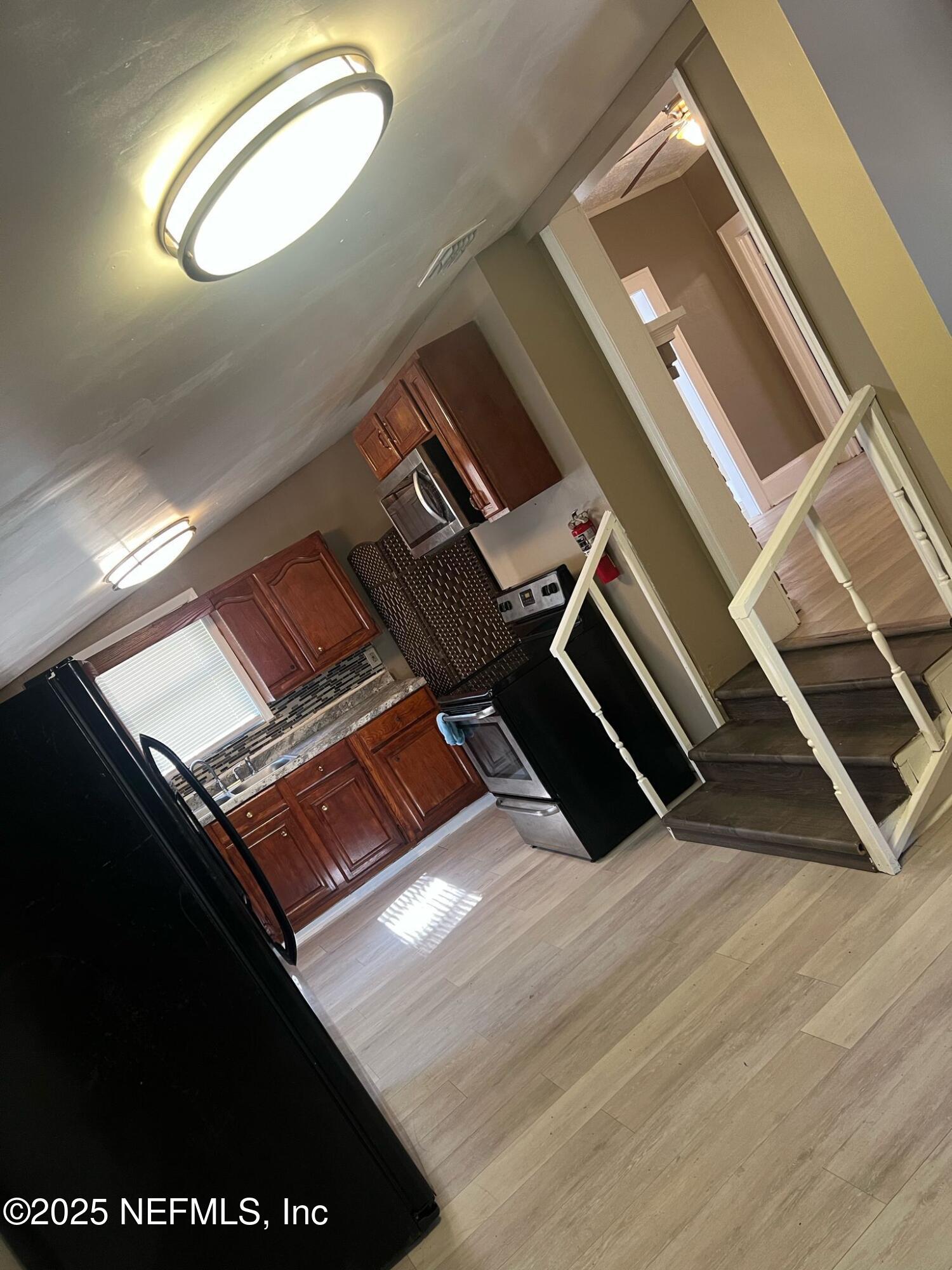 2815 Fleming Street Jacksonville, FL 32254 - Photo 20 of 37 an empty room with wooden floor