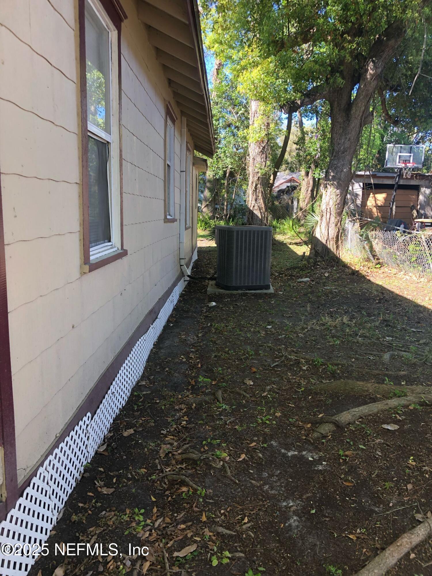 2815 Fleming Street Jacksonville, FL 32254 - Photo 26 of 37 a view of house with backyard and sitting area