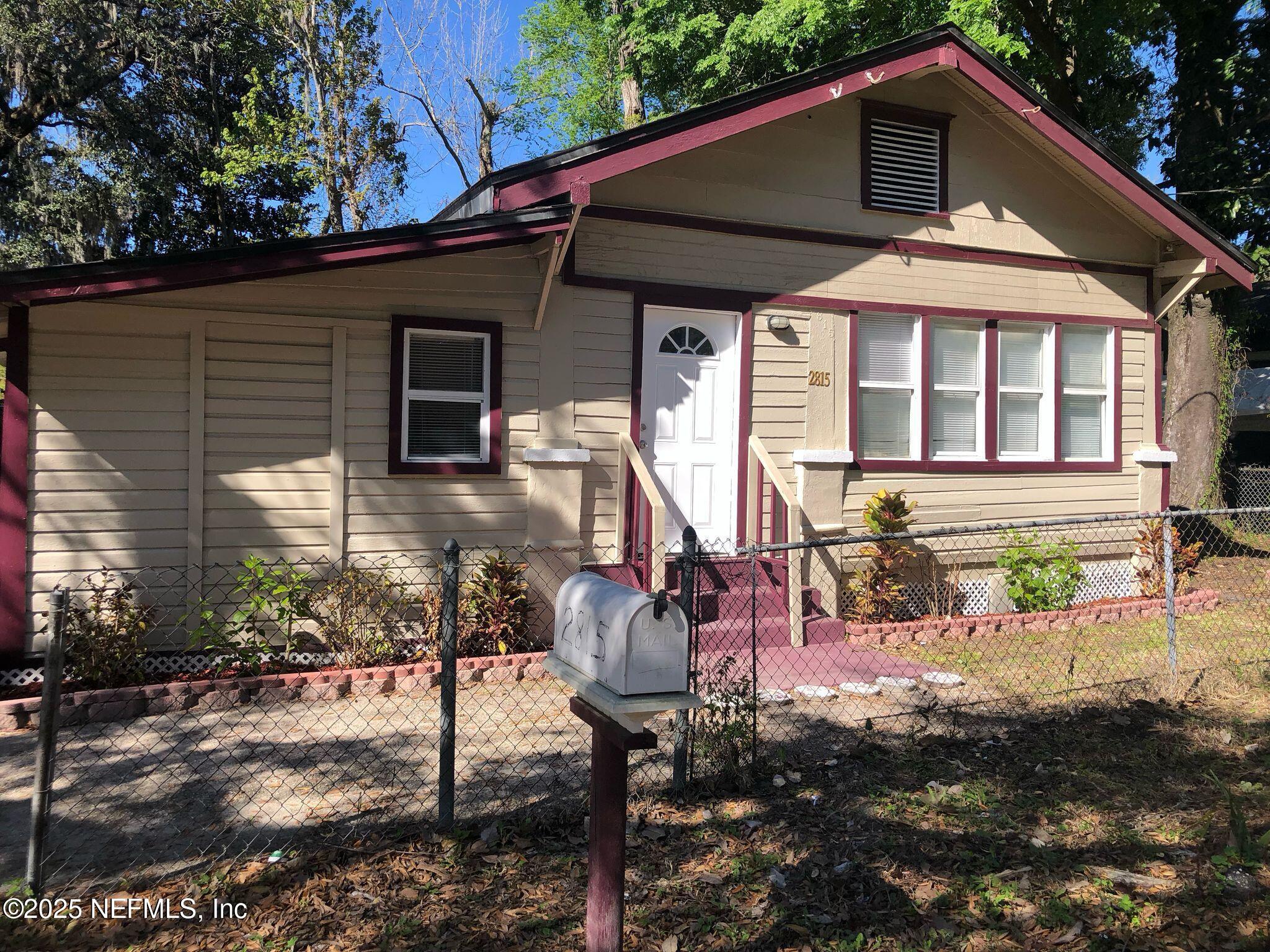 2815 Fleming Street Jacksonville, FL 32254 - Photo 30 of 37 a front view of a house with garden