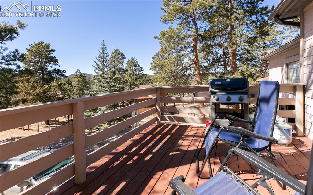 840 West Kelly Road Woodland Park, CO 80863 - Photo 21 of 37 a view of a balcony with chairs