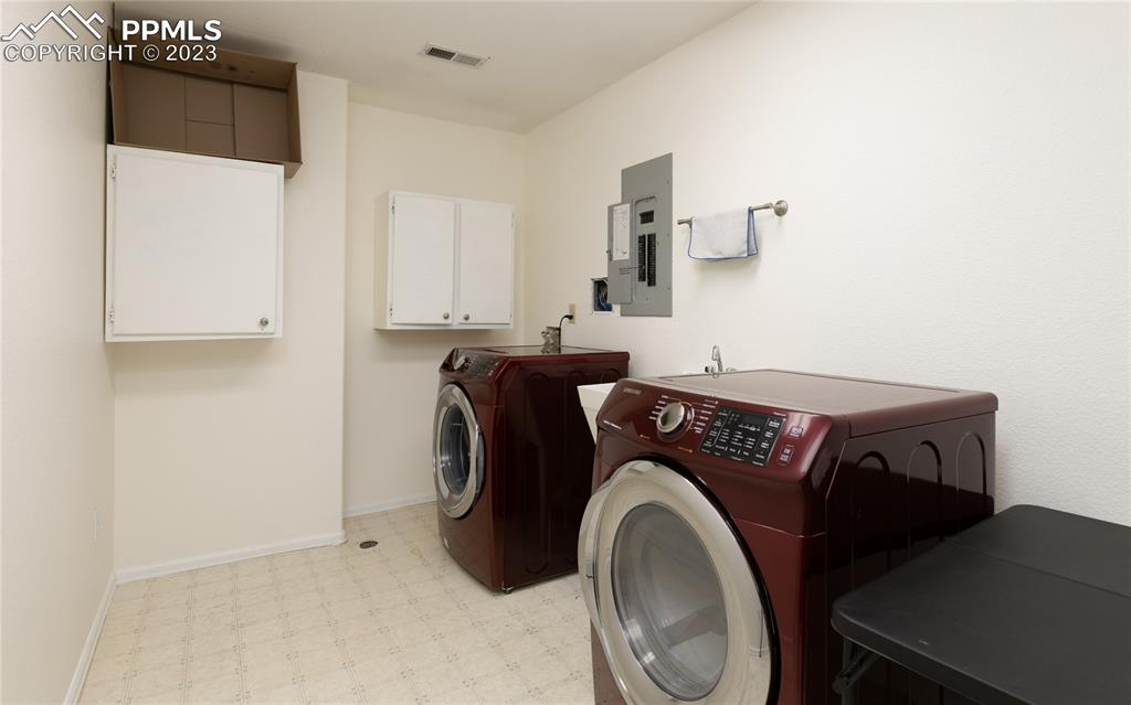 840 West Kelly Road Woodland Park, CO 80863 - Photo 33 of 37 a utility room with dryer and washer