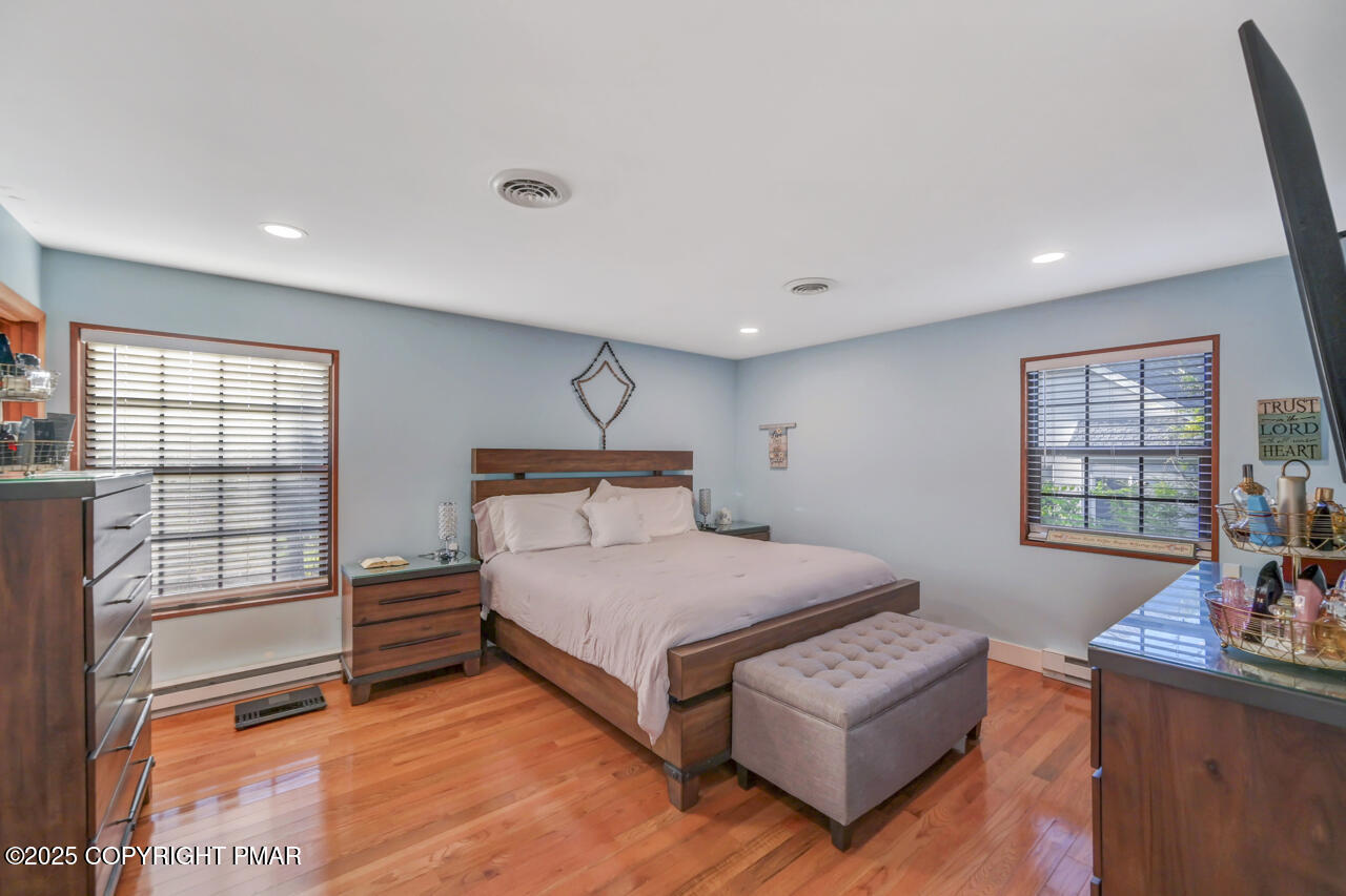9 Gap View Heights Road East Stroudsburg, PA 18301 - Photo 27 of 57 a bedroom with a bed and a large window