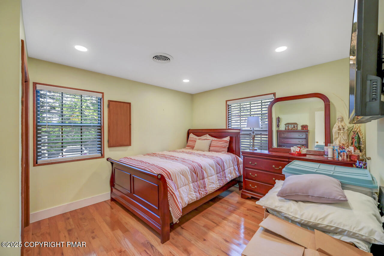 9 Gap View Heights Road East Stroudsburg, PA 18301 - Photo 33 of 57 a bedroom with bed and a large window