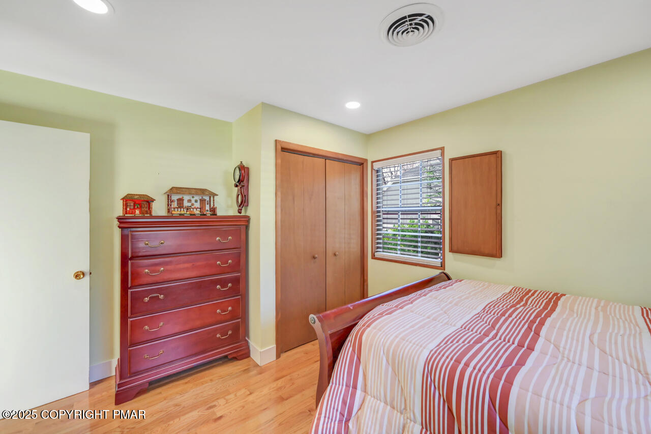 9 Gap View Heights Road East Stroudsburg, PA 18301 - Photo 35 of 57 a bedroom with a bed and a dresser