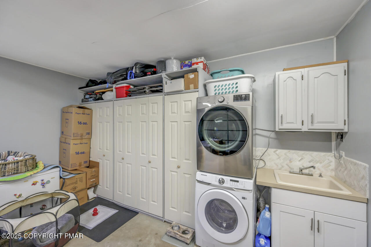 9 Gap View Heights Road East Stroudsburg, PA 18301 - Photo 42 of 57 a utility room with dryer and washer