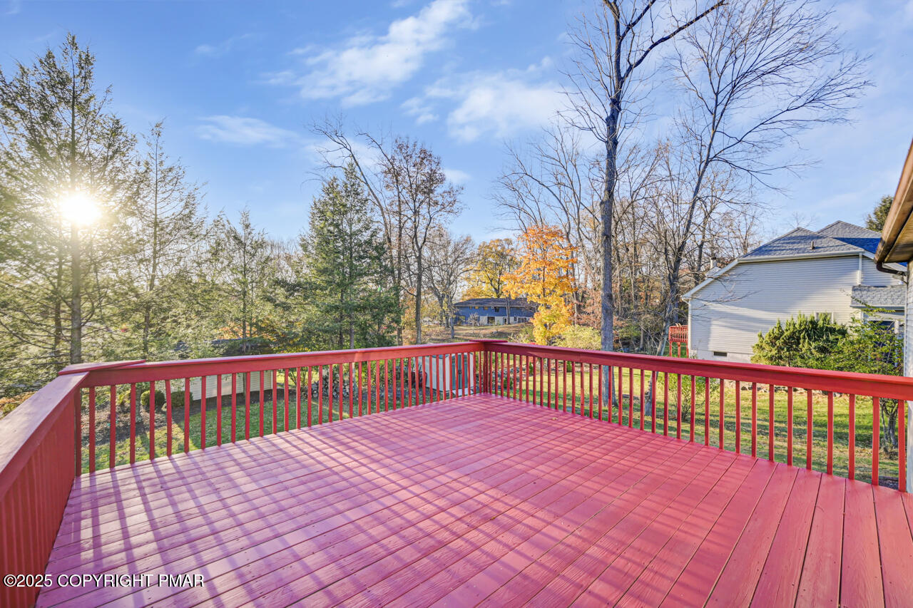 9 Gap View Heights Road East Stroudsburg, PA 18301 - Photo 46 of 57 a view of a roof deck with wooden floor and fence
