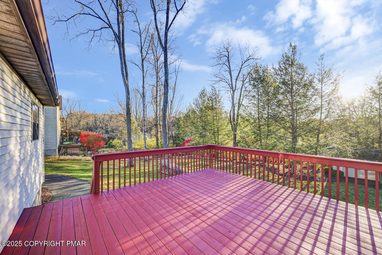 9 Gap View Heights Road East Stroudsburg, PA 18301 - Photo 47 of 57 a view of a wooden deck with a yard