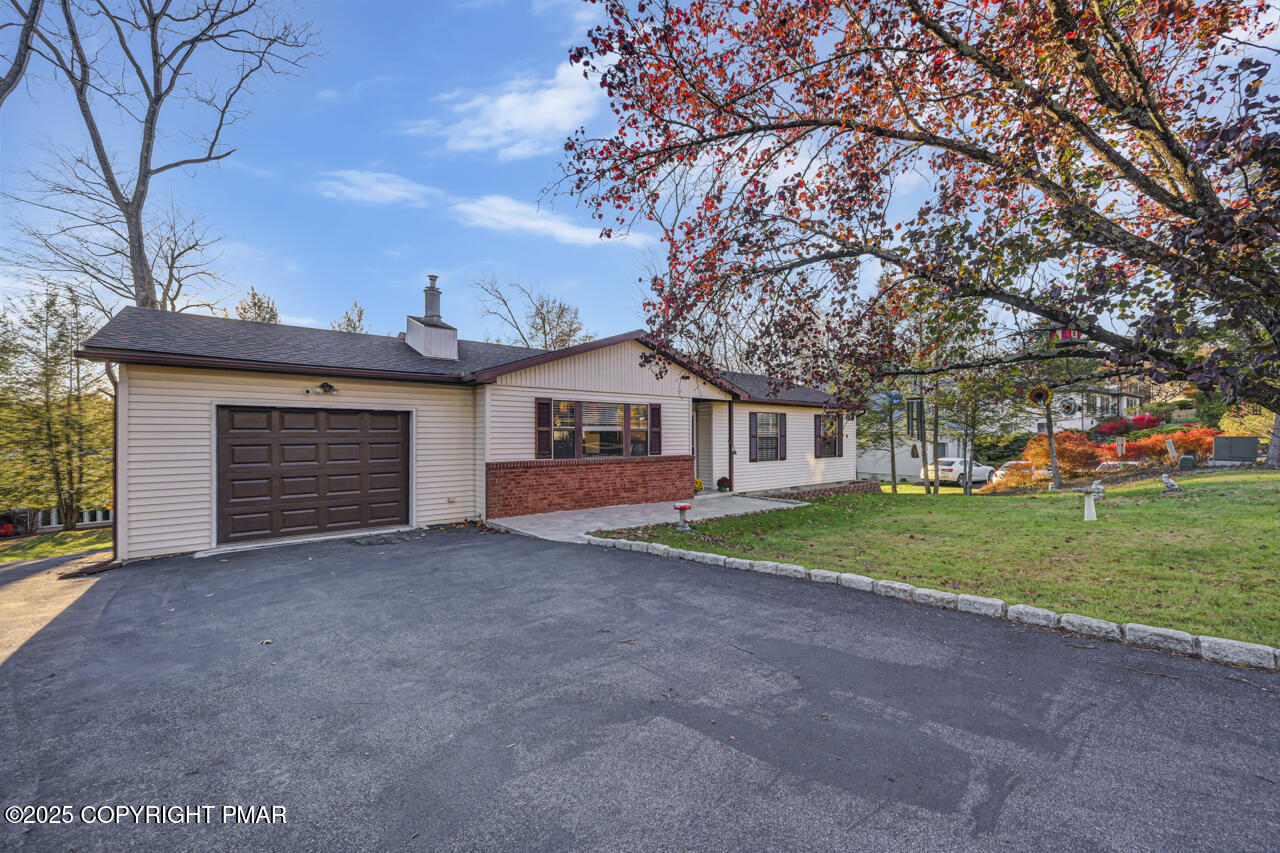 9 Gap View Heights Road East Stroudsburg, PA 18301 - Photo 54 of 57 a view of a house with a yard and garage