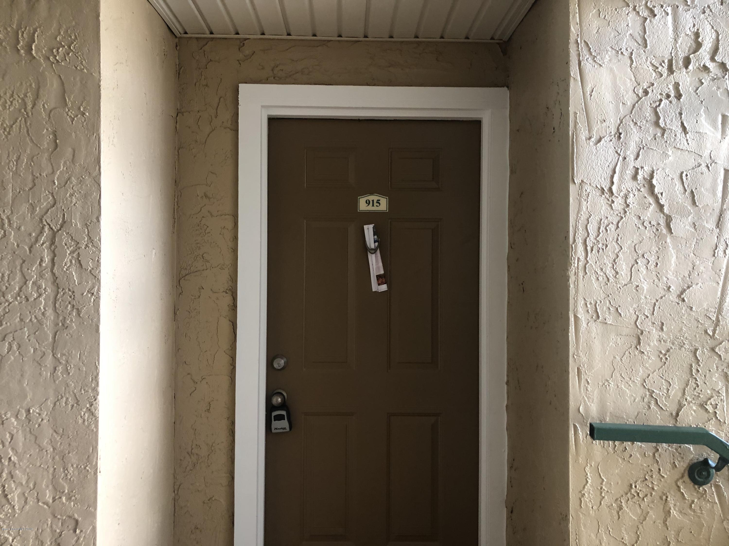 7667 North Wickham Road, Unit 915 Melbourne, FL 32940 - Photo 2 of 12 a close view of a wooden door