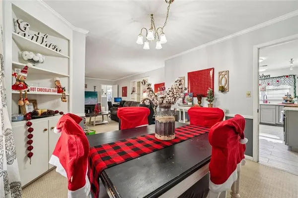 a view of a dining room with furniture