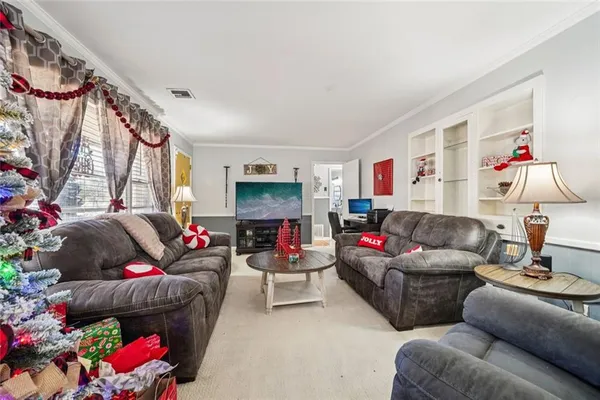 a living room with furniture and a couch