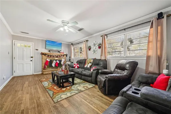 a living room with furniture and a window