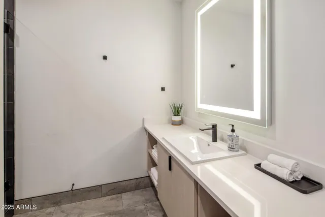 a view of small space with empty racks on the wall